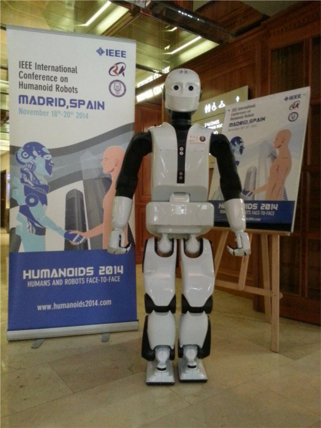 REEM-C robot standing at the Humanoids 2014 Conference