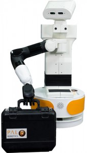 The mobile manipulator robot TIAGo grabs a suitecase with one arm