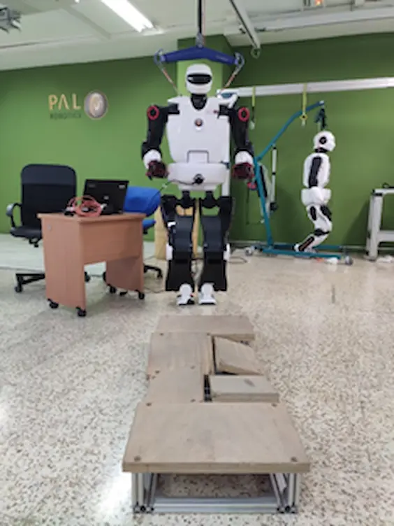 The biped robot TALOS walking over uneven terrain