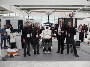 PAL Robotics' CEO Francesco Ferro and CTO Luca Marchionni with Carlos Balaguer at IROS 2018