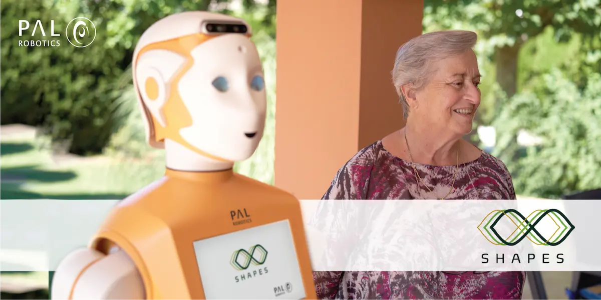 Social robot ARI with an elderly woman during project SHAPES