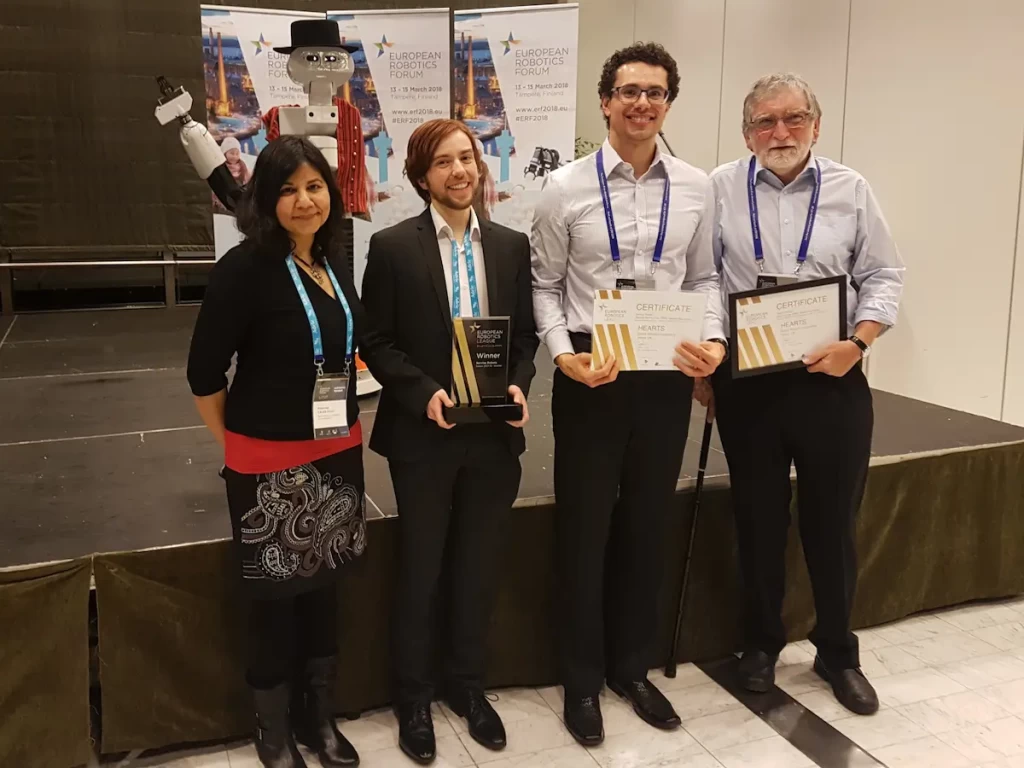 A winner of the European Robotics League (ERL) 2018 is presented an award