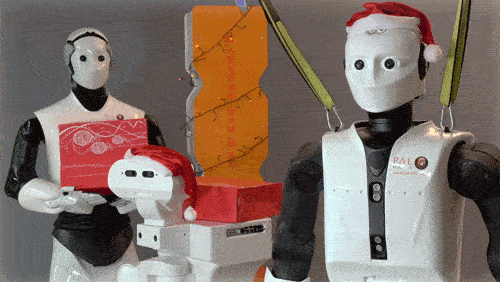 The robots TIAGo, REEM-C, and ARI wishing a merry Christmas!