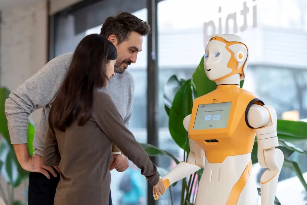 The collaborative robot ARI interacting with two people