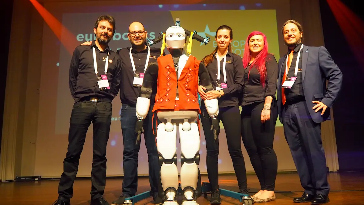 PAL Robotics' team with the biped robot REEM-C at the European Robotics Forum 2019