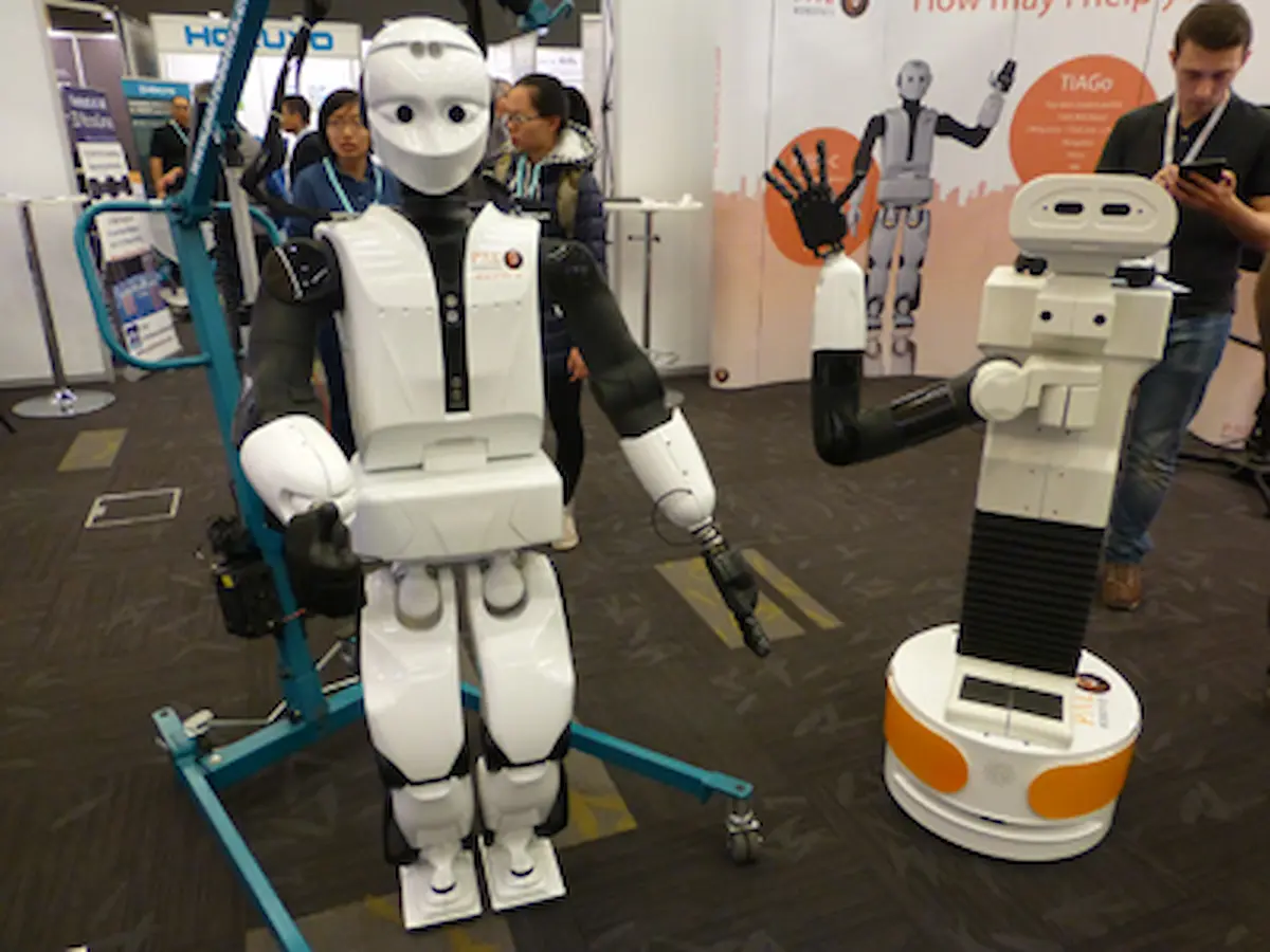 The robots REEM-C and TIAGo of PAL Robotics at the event ICRA 2016