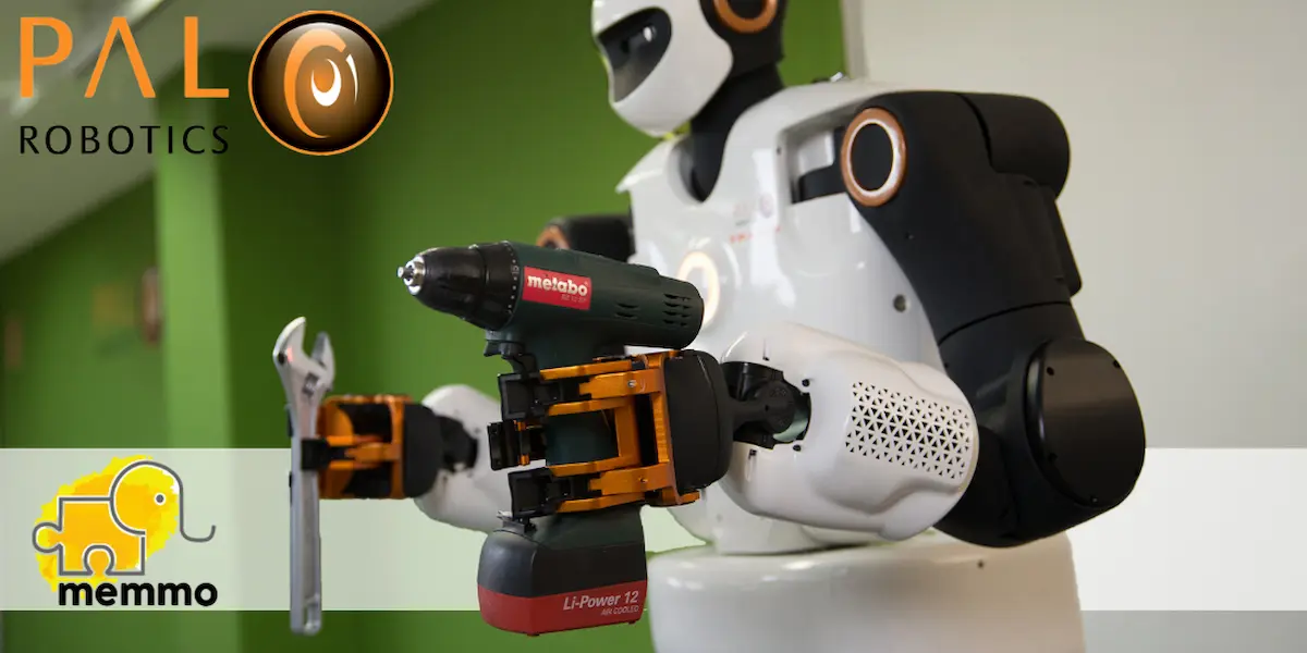 Biped robot TALOS holding a drill and a wrench with its gripper hands