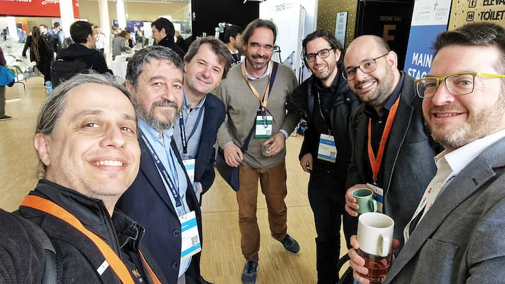 PAL Robotics' CEO Francesco Ferro and Business Manager Carlos Vivas with other robotics colleagues at ERF 2023