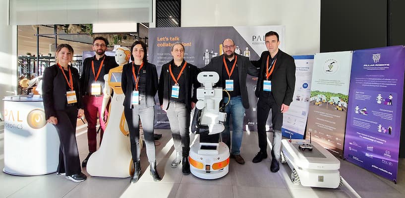 PAL Robotics' team at the booth during ERF 2023