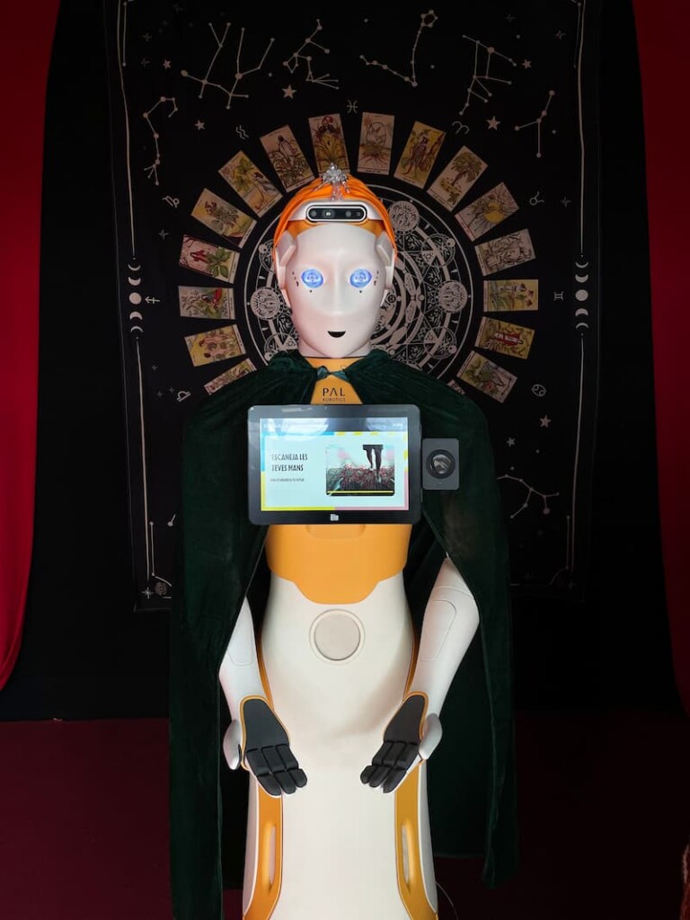PAL Robotics' social robot ARI at the Cruïlla festival telling the fortune to visitors